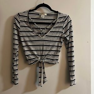 Black and white striped long-sleeve crop top. Size small. Never worn. Like new.